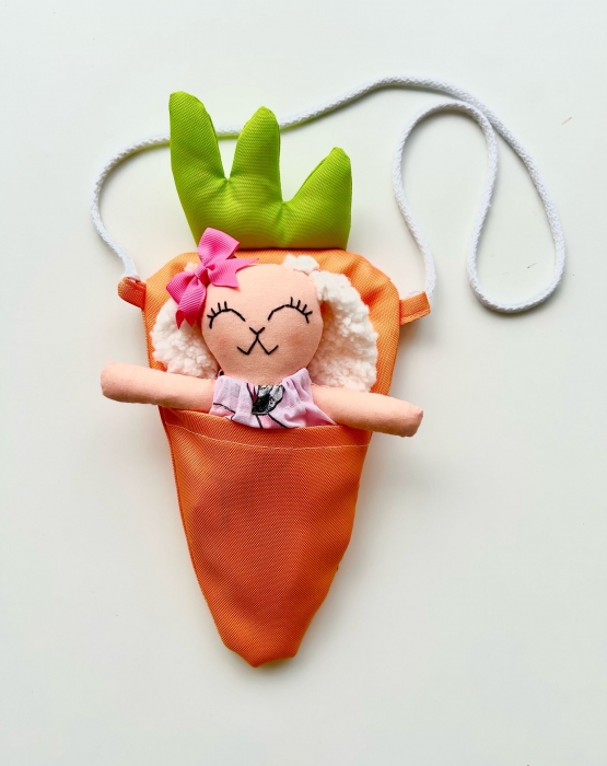Bunny girl with orange carrot